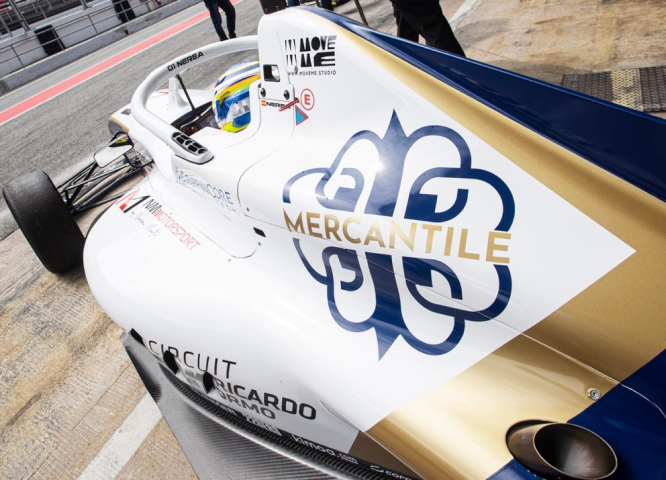 Mercantile monogram displayed on the bodywork of an F4 race car.