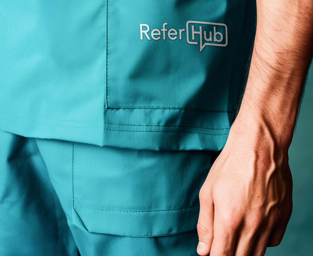 ReferHub branding on a staff uniform.