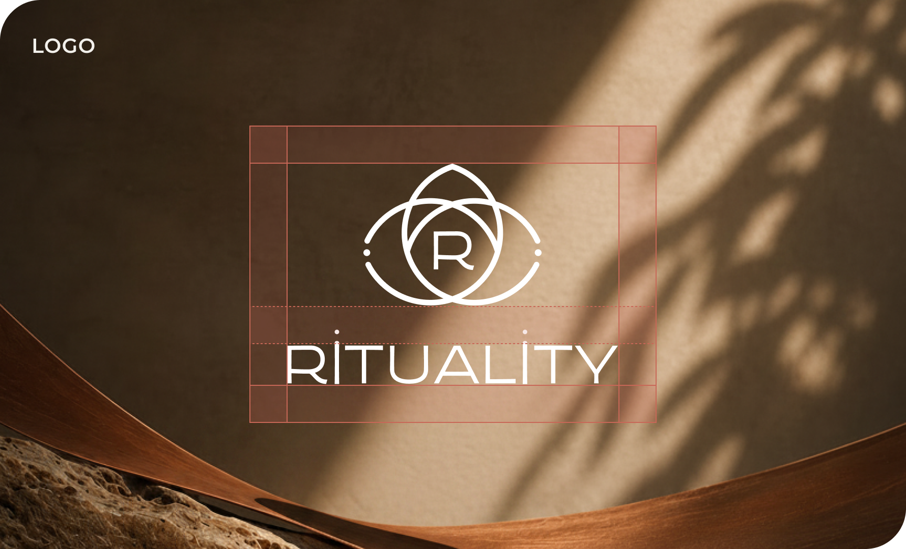 Rituality stacked logo construction guides over a warm organic background.