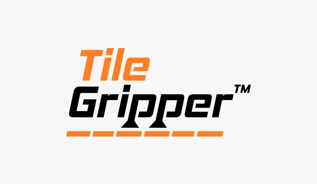 Orange and black Tile Gripper logo on a light background.